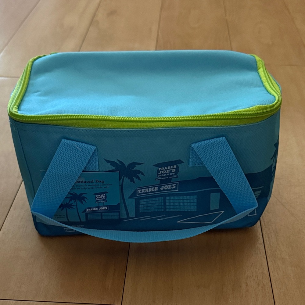 NEW Trader Joe’s mini cooler bag 

New with tags never used